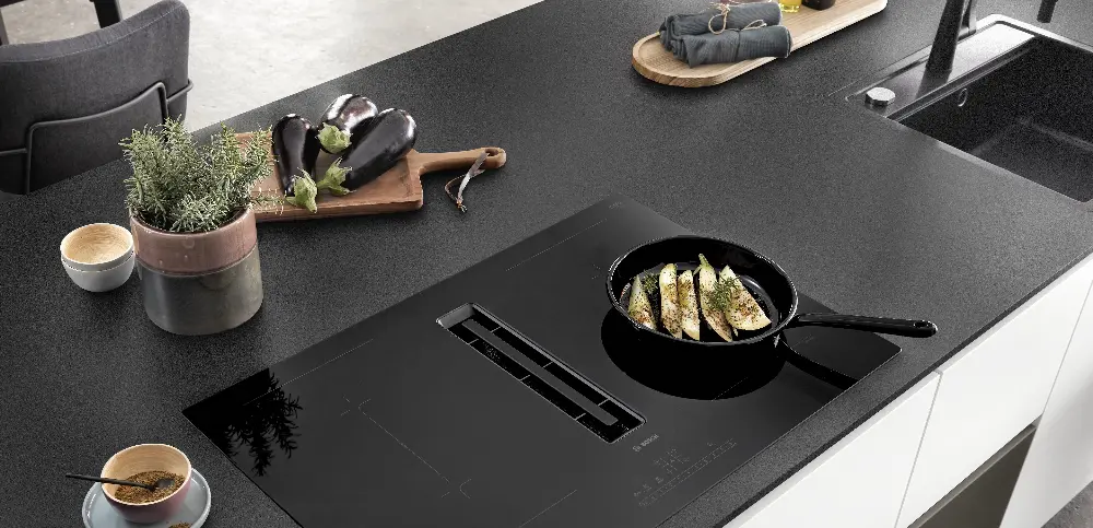 Artworks are placed around the stove Artworks are placed around the stove