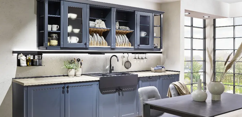 Blue Farmhouse Kitchen with farmhouse typical sink Blue Farmhouse Kitchen with farmhouse typical sink