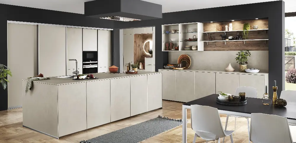 Open kitchen with light grey coloured kitchen island Open kitchen with light grey coloured kitchen island