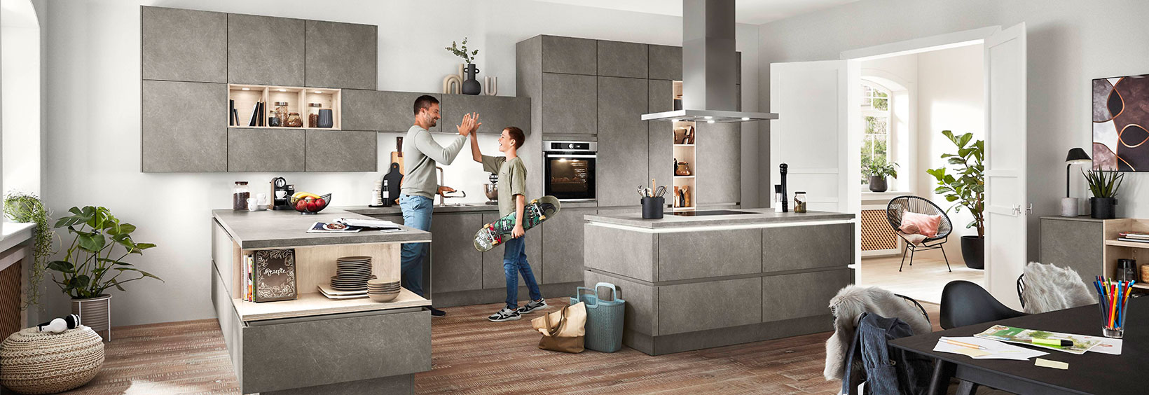 Father and son in a contemporary kitchen Father and son in a contemporary kitchen