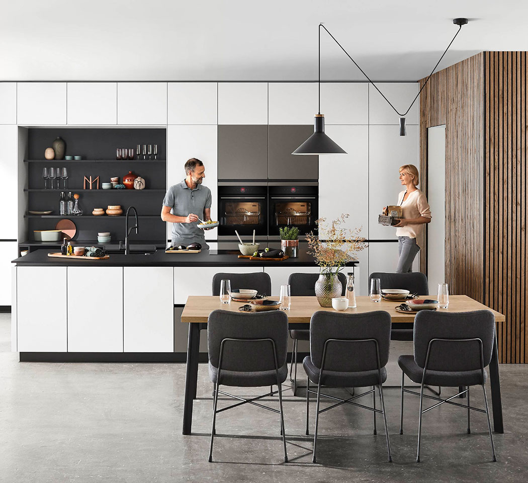 Couple in a modern kitchen Couple in a modern kitchen
